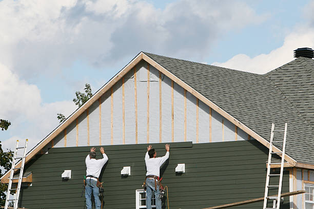 Professional Siding Installation technician working in Occoquan, VA